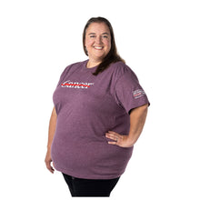 MD Anderson employee wearing a heather maroon shirt featuring the white cancer strikethrough logo on the chest and the white  MD Anderson logo on the sleeve.