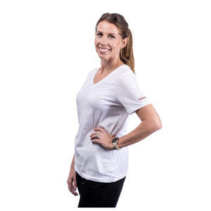 MD Anderson employee wearing a white BELLA+CANVAS v-neck shirt featuring the black cancer strikethrough logo on the sleeve.