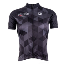 Black cycling jersey with a gray grid pattern featuring the white MD Anderson logo on the upper right chest area and the white GIORDADA logo on the upper left chest area.