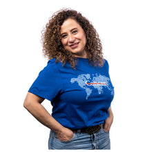 MD Anderson employee wearing a blue t-shirt featuring a map of the world in different tones of blue dots, and the white cancer strikethrough logo in the middle.