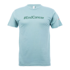 Light blue saltwater shirt featuring the tagline #EndCancer in darker color with the white cancer strikethrough logo on the sleeve.