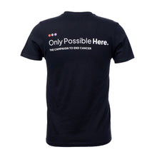Back of black t-shirt featuring the tagline in white "Only Possible Here, the campaign to end cancer."