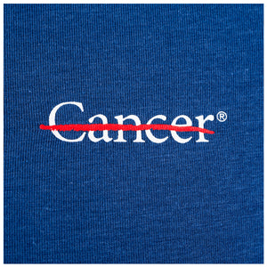 Closeup of the white cancer strikethrough logo.