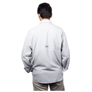 MD Anderson employee showing the back of a Columbia button up shirt featuring the Columbia logo on back.