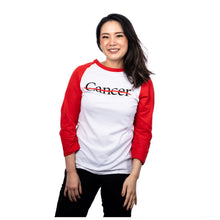 MD Anderson raglan shirt with red sleeves featuring the black cancer strikethrough logo on the chest area.