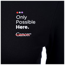 Closeup of the white tagline "Only Possible Here" and the white cancer strikethrough logo.