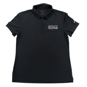 Black Nike polo with a V-neck featuring the white MD Anderson logo on the chest area and the Nike logo on the sleeve.