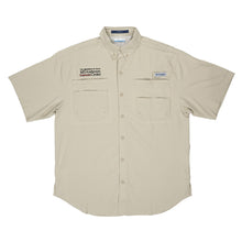 Short sleeve tan Columbia button-up shirt with two chest pockets, featuring the black MD Anderson logo on one side and the Columbia logo on the other side.