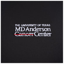 Closeup of white MD Anderson logo.