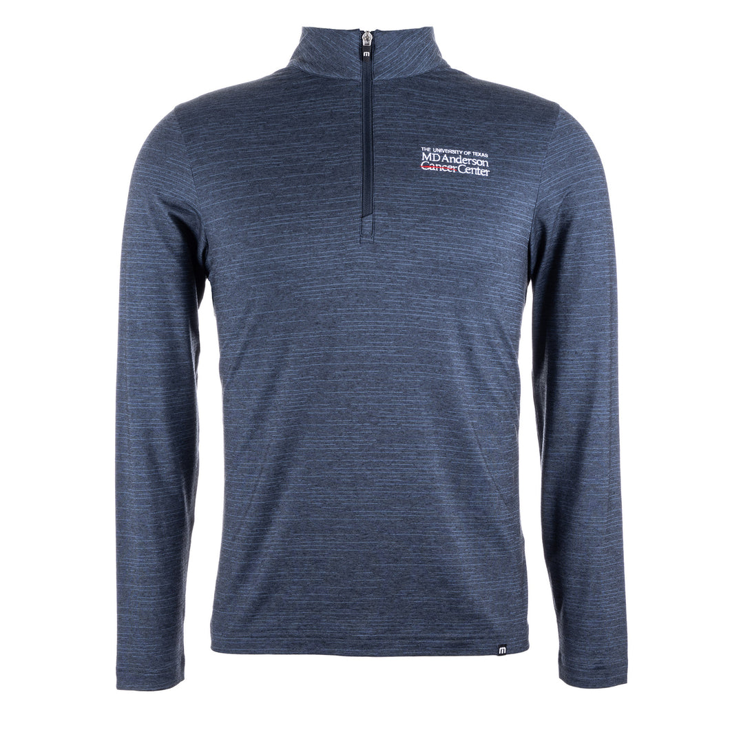 Blue Travis Mathew 1/4 Zip featuring the white MD Anderson logo on the upper left side of the chest area.