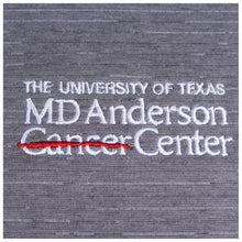 Closeup of white MD Anderson logo.