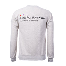Back of heather oatmeal crewneck featuring the black tagline "Only Possible Here, the campaign to end cancer."
