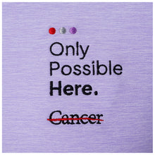 Closeup of the "Only Possible Here" tagline and the black cancer strikethrough logo