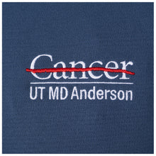 Closeup of the white UT MD Anderson logo.