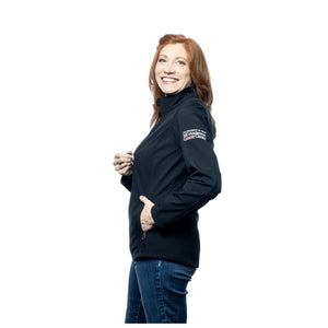 MD Anderson employee wearing a black soft-shell jacket featuring the white MD Anderson logo on the sleeve.