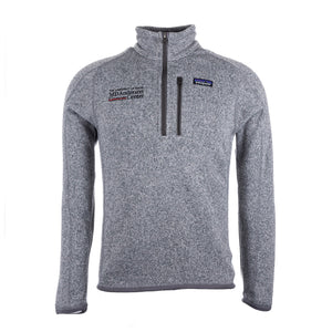 Gray Patagonia 1/4 zip jacket, featuring the black MD Anderson logo on the upper right and the Patagonia plogo on the upper left.