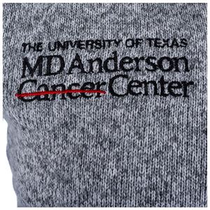 Closeup of black MD Anderson logo.