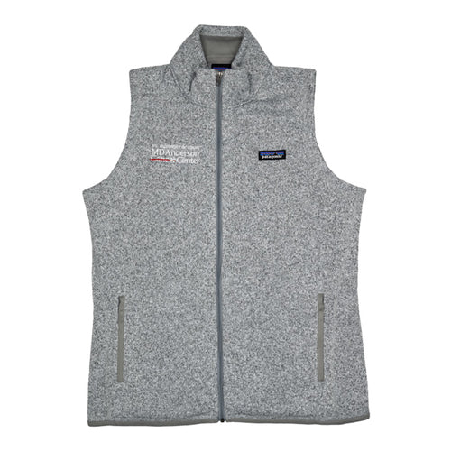 Grey Patagonia ladies fleece vest with full zip featuring the white MD Anderson logo on one side and the Patagonia logo on the other side. 