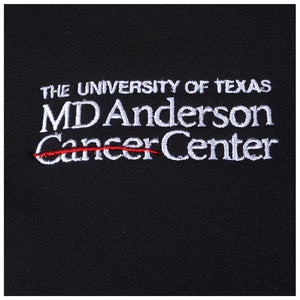 Closeup of full white MD Anderson logo.