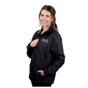 MD Anderson employee wearing a black puffy zippered jacket with front pockets featuring the full white MD Anderson logo on the top left chest area.