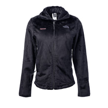 Fuzzy black North Face jacket featuring the white cancer strikethrough logo on the top right chest area and the gray North Face logo on the top left chest area, with zippered pockets.