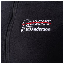Closeup of white UT MD Anderson logo.