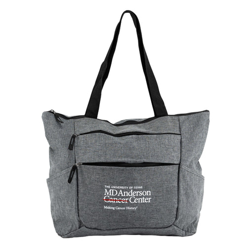 Gray tote bag with two front pockets featuring the white MD Anderson logo on the front.