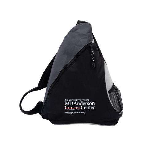 Gray and black slingpack with a zippered pocket on the front and a mesh water bottle compartment on the side, featuring the white MD Anderson logo.