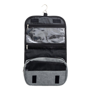 Open toiletry bag displaying a hanger, plastic zippered pockets and a central fabric pocket.