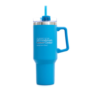 Turquoise 40 oz. travel mug with a straw and  handle, featuring the white MD Anderson logo on the front.