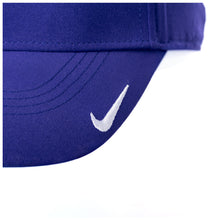 Closeup of Nike swoosh on the front left side of the cap.