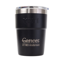 Black YETI 16 oz Rambler Tumbler featuring the full UT MD Anderson logo etched on the front.