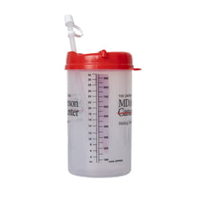 Clear 32oz. tumbler with red lid and thick straw featuring the full black MD Anderson logo and the ounce capacity measurements.