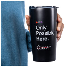 Black tumbler with plastic lid featuring the tagline "Only Possible Here" with the white cancer strikethrough logo.