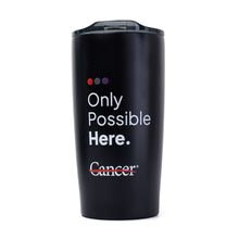 Black tumbler with plastic lid featuring the tagline "Only Possible Here" with the white cancer strikethrough logo.
