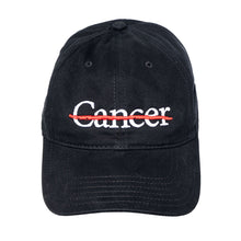 Black cap featuring the white cancer strikethrough logo.