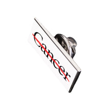 Side view of lapel pin featuring the cancer strikethrough logo, with pin back.