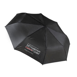 Open black umbrella featuring the full white MD Anderson logo.