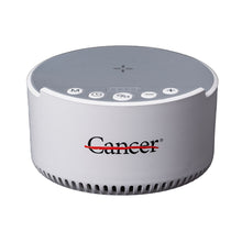 White Bluetooth sound machine with a speaker top, featuring the black cancer strikethrough logo, The front control panel includes clearly labeled buttons for power, sleep mode, play/pause, timer, light, volume up and down, and Bluetooth connectivity.