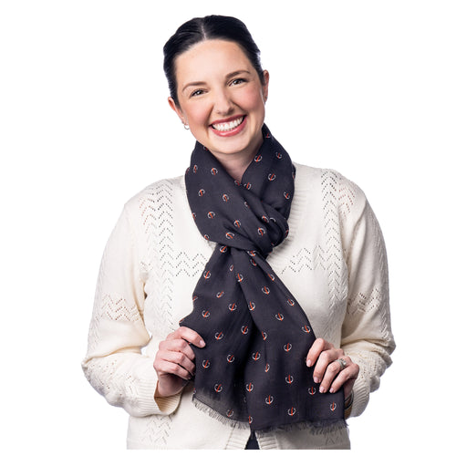 MD Anderson employee wearing the black scarf featuring the white strikethrough 