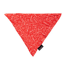 Red pet bandana featuring a design with various images, including the words "strength, courage, #endcancer, and live big", featuring the white cancer strikethrough logo on the side.