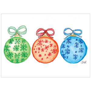 Card featuring three different colored ornaments.