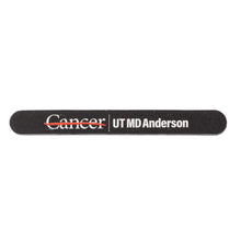 Black salon board featuring the full white UT MD Anderson logo.
