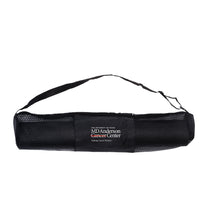 Black yoga mat inside black mesh bag with shoulder strap, featuring the white MD Anderson logo.