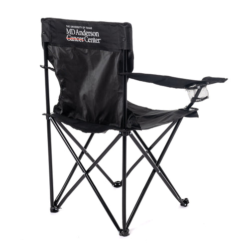 Back of black folding chair featuring the full white MD Anderson logo in the middle.