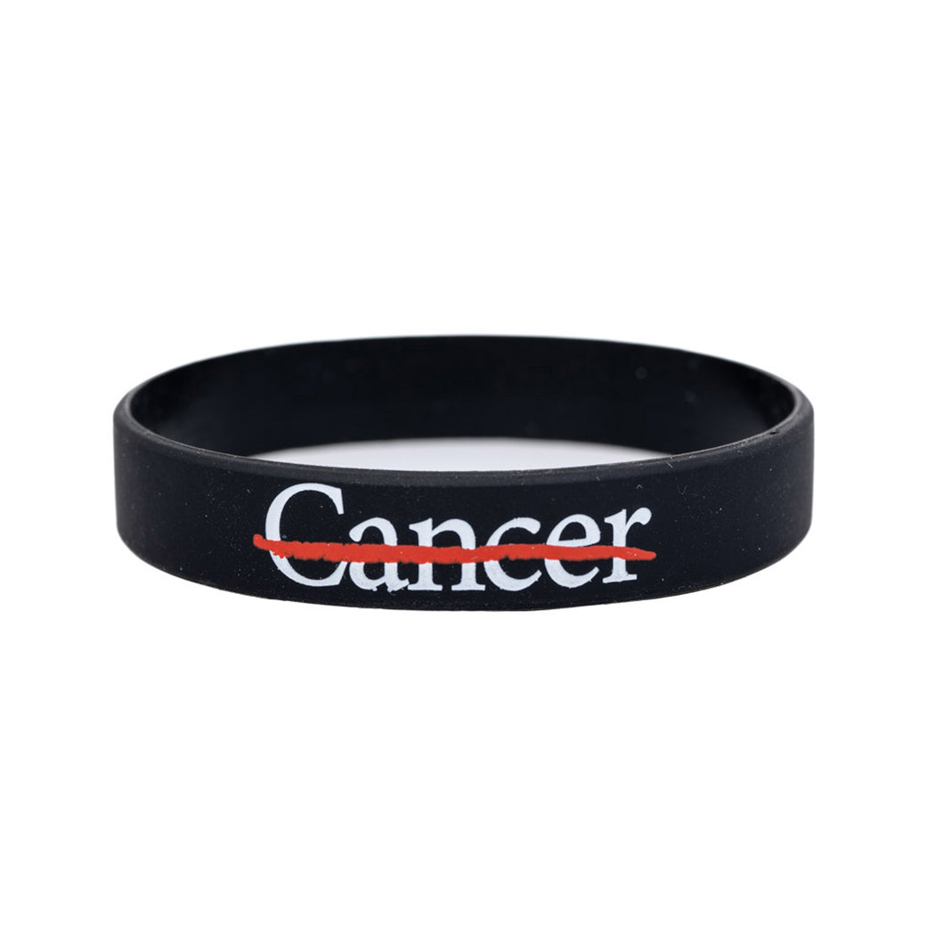 Black silicone bracelet featuring the white cancer strikethrough logo.