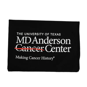 Black cooling towel featuring the full white MD Anderson logo on the bottom.